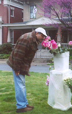 Man Smelling Flowers