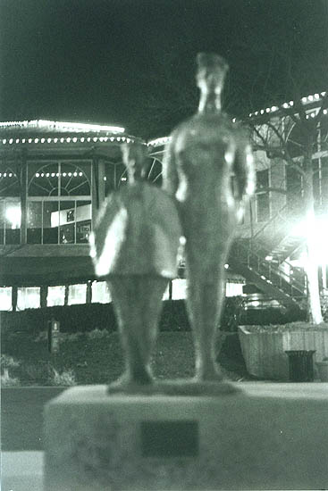 Statues at waterside